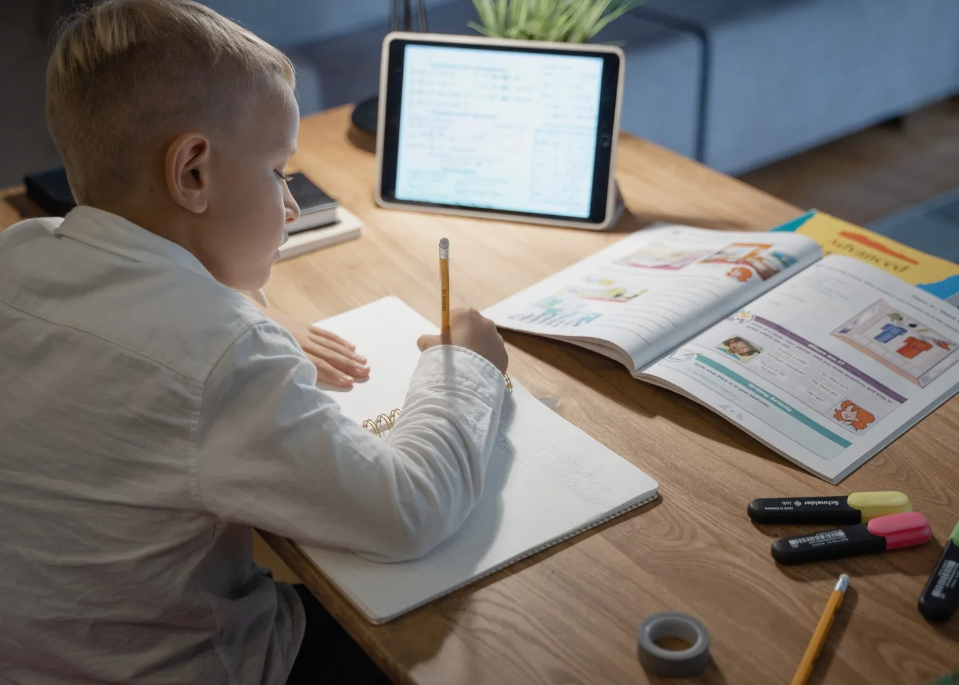 A child taking part in an online language lesson